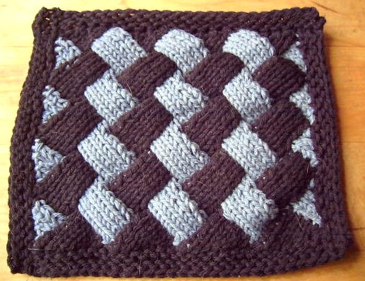 Here is a black & blue square dishcloth I made before taking the class.